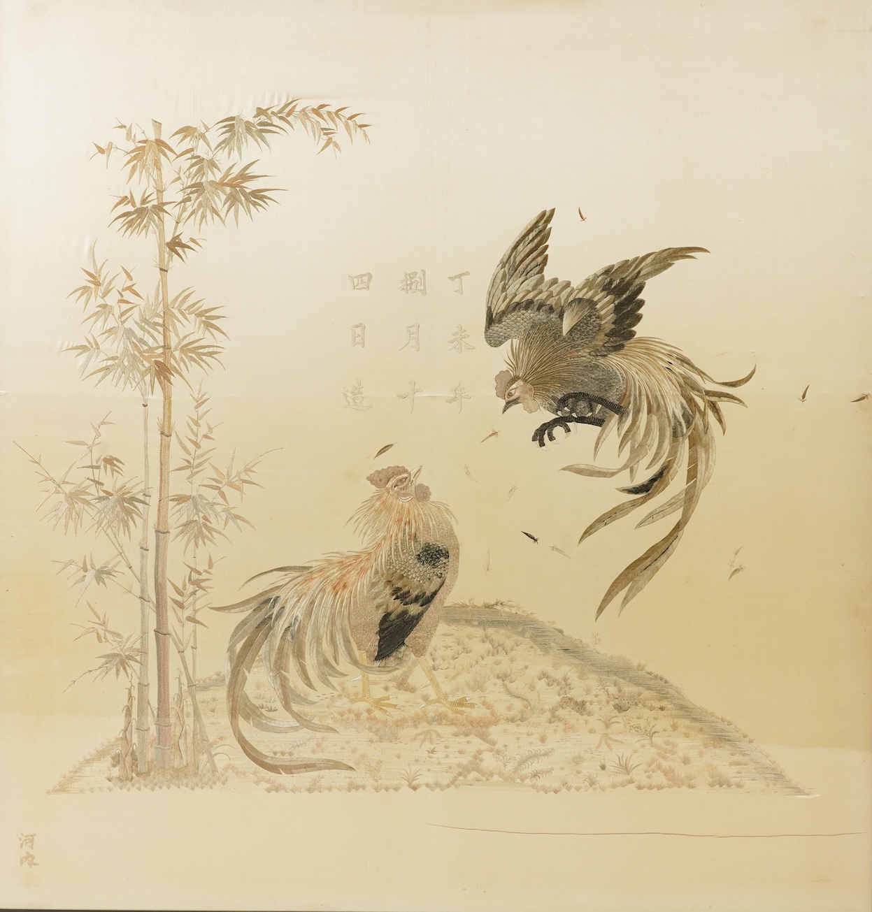A large Japanese embroidered ‘fighting cockerels’ panel, Meiji period, signed Kawauchi, dated August 14, 1907